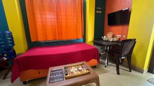 Postel nebo postele na pokoji v ubytování Hi5 Holiday Apartments - Udupi