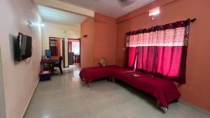 TV a/nebo společenská místnost v ubytování Hi5 Holiday Apartments - Udupi