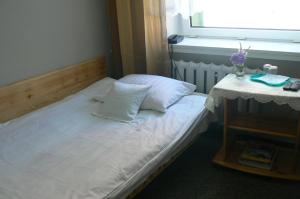 Posteľ alebo postele v izbe v ubytovaní Hotel Śnieżnik