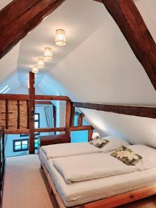 Postel nebo postele na pokoji v ubytování Landhaus am Aremberg / Eifel