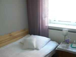 Posteľ alebo postele v izbe v ubytovaní Hotel Śnieżnik