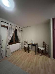Postel nebo postele na pokoji v ubytování Chambre Au Grès des Vosges - À l'Ancien Hôtel de Reichsfeld