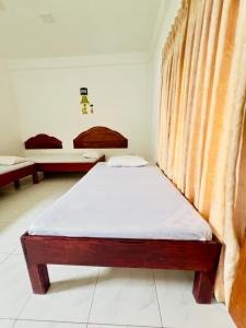 Letto o letti in una camera di Seafood king hostel