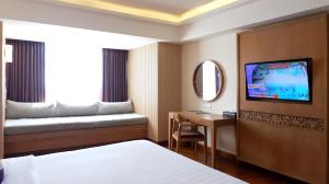 TV o dispositivi per l'intrattenimento presso FOX Hotel Jimbaran Beach Bali