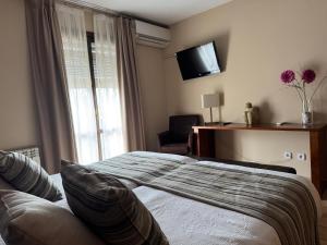 Postel nebo postele na pokoji v ubytování Hotel Guara Inlukā