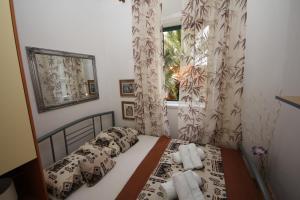 Posteľ alebo postele v izbe v ubytovaní Apartment Adriatica City