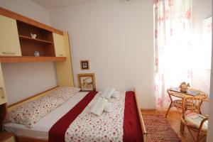 Posteľ alebo postele v izbe v ubytovaní Apartment Adriatica City