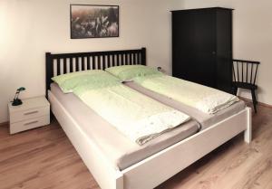 Postel nebo postele na pokoji v ubytování Apartment am Mühlbach