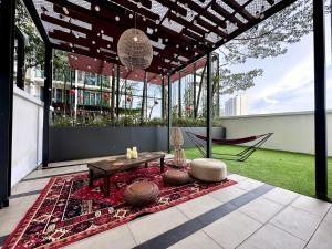Κήπος έξω από το The Shore Residences Melaka By Short Escape
