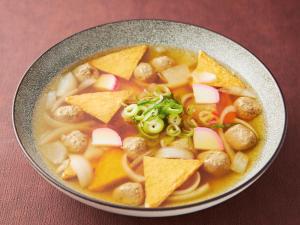 a bowl of soup with meatballs and cheese and chips at APA Hotel & Resort Osaka Namba Ekimae Tower in Osaka