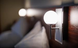 Postel nebo postele na pokoji v ubytování Continental Hotel-Pension