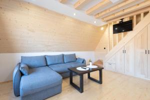 Televisor o centre d'entreteniment de Holiday Home Ella Mokra Gora - Apartman Ella