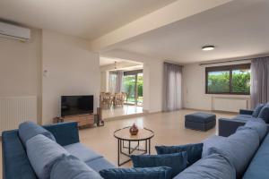 Χώρος καθιστικού στο Orange Tree Villas