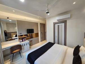 Voodi või voodid majutusasutuse Hotel Glorious Grand toas
