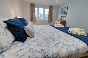 Postel nebo postele na pokoji v ubytování Cosy one bedroom cottage in Pickering