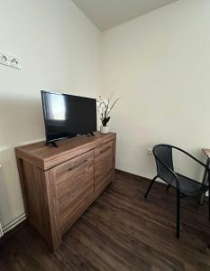 TV a/nebo společenská místnost v ubytování Motel Roudnice