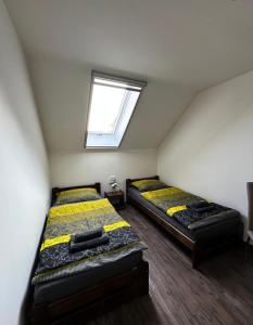 Postel nebo postele na pokoji v ubytování Motel Roudnice