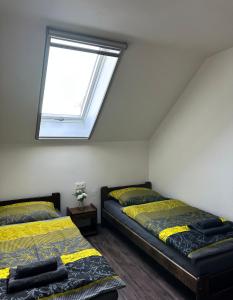 Postel nebo postele na pokoji v ubytování Motel Roudnice