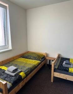 Postel nebo postele na pokoji v ubytování Motel Roudnice