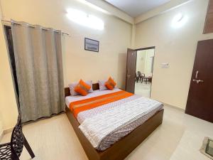 Postel nebo postele na pokoji v ubytování Kashi Paradise Stay by visitkashi