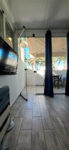 a room with a tent and a tiled floor at CasaBarco in Costa Del Silencio
