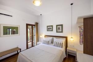 Katil atau katil-katil dalam bilik di Villa DiStella
