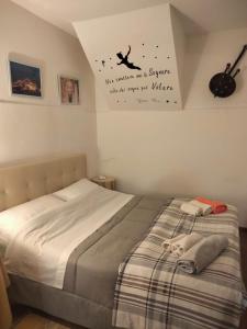 Postel nebo postele na pokoji v ubytování Bnb Peter Pan