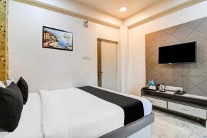TV a/nebo společenská místnost v ubytování Hotel O Tagore Park