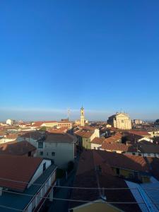 a view of a city with roofs of buildings at AJ BeB in Cigliano +5 photos