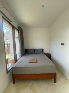 Postel nebo postele na pokoji v ubytování the corner homestay + 19 fotografií