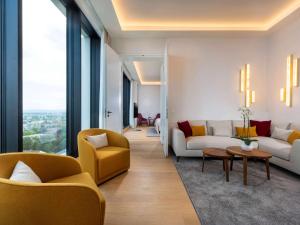 Posezení v ubytování Mövenpick Hotel Basel