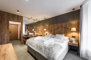 Posteľ alebo postele v izbe v ubytovaní Wellness Hotel Svornost