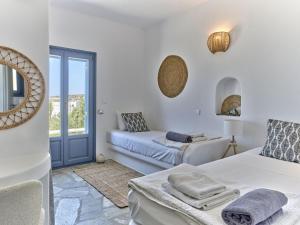 Ένα ή περισσότερα κρεβάτια σε δωμάτιο στο Villa Dalida +50 φωτογραφίες