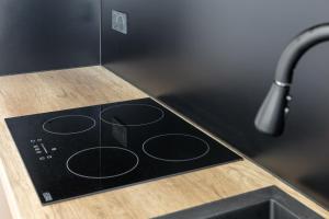 Η κουζίνα ή μικρή κουζίνα στο La SerenBlue - chambre en colocation +22 φωτογραφίες