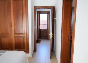 Ein Bett oder Betten in einem Zimmer der Unterkunft CASA VELA by Mhousing