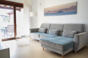 Ein Sitzbereich in der Unterkunft CASA VELA by Mhousing