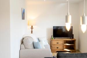 TV a/nebo společenská místnost v ubytování Casa dos Santos