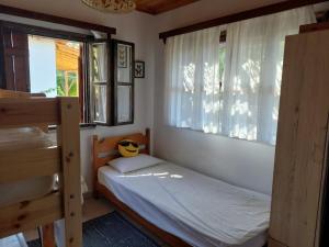 A bed or beds in a room at Villa Achilleas