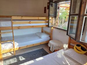 A bed or beds in a room at Villa Achilleas