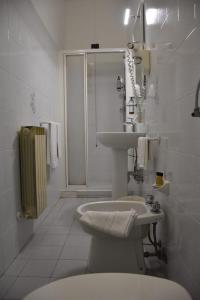 Koupelna v ubytování Hotel Le Palme