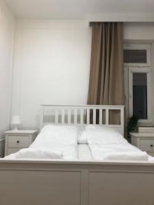 Postel nebo postele na pokoji v ubytování Sands Sopot Apartments B