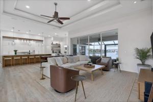 a living room with a couch and a table at SAN3337 Canalfront Vacation Pool Home in Punta Gorda