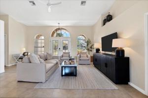 a living room with a couch and a table at GIC120 Punta Gorda Isles in Punta Gorda