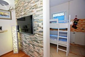 En eller flere senge i et værelse på Holiday Home Laura + 53 billeder