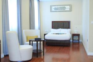 Omna Addis Hotel客房内的一张或多张床位