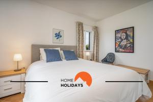 Giường trong phòng chung tại #294 T2 Com Amplo Terraço by Home Holidays