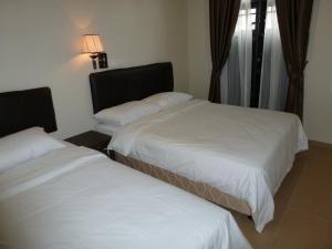 Postel nebo postele na pokoji v ubytování Hotel Hong