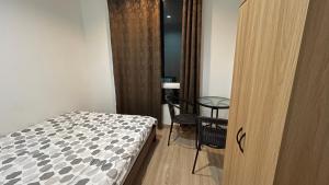 ไนซ์สเตย์ เฮาส์ แอทคลองสาม รังสิต คลองหลวง ปทุมธานี Nice Stay House at Khlong Sam - Rangsit - Khlong Luang - Phathumthani客房内的一张或多张床位