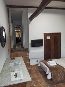 Telewizja i/lub zestaw kina domowego w obiekcie Casa Taboada