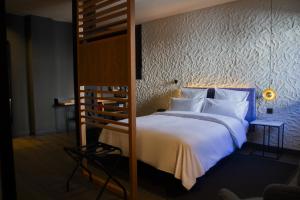 a bedroom with a bed and a bunk bed at Letoh Letoh Bilbao in Bilbao